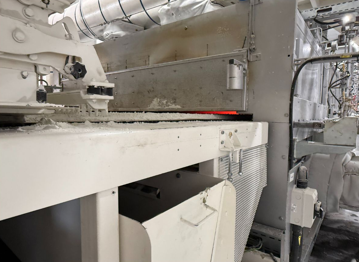 Foam glass aggregate emerging from ACE’s production equipment